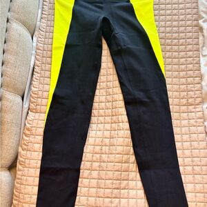 Alo yoga women’s High Waste Trainer Legging black with neon green panels